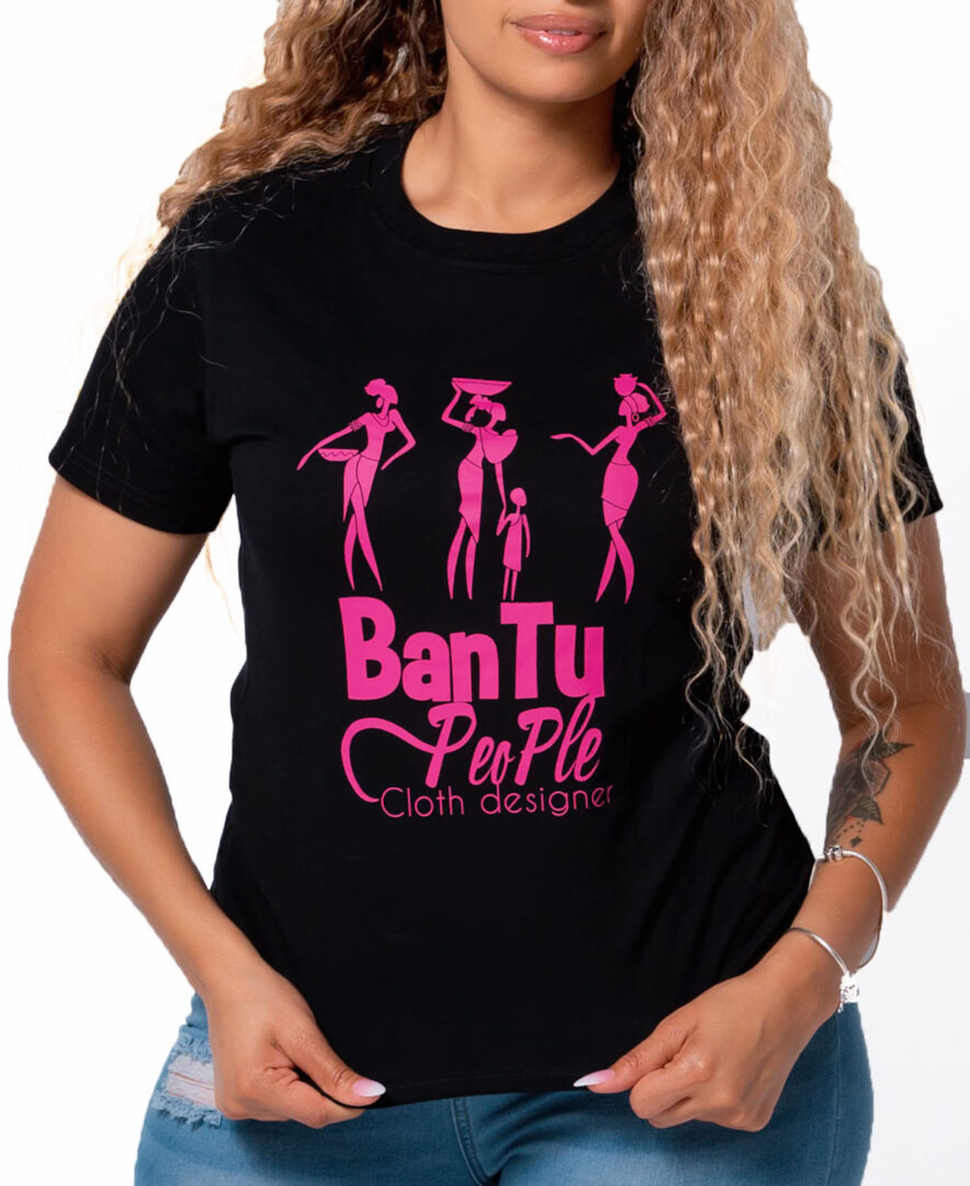 Black Pink t-shirt design featuring three African women silhouettes carrying water, children and culture symbols representing woman as source of life and cultural heritage